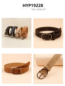 Detail view of retro faux leather belt showing white contrast stitching and oval metal buckle