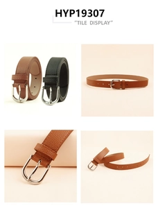 Detail view of vintage belts with silver U-shaped metal buckles and neat side stitching