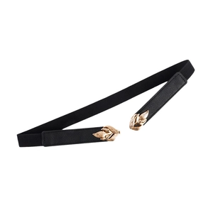 Elegant women's black elastic thin belt with gold leaf-shaped metal buckle on white background
