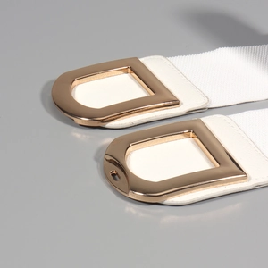 Elastic white belt for women with polished gold D-buckle and leather base detail