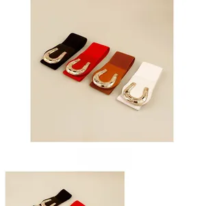 Detail view of four colors elastic waist belts with gold horseshoe metal buckles for women