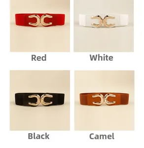 Elastic waist belts for women in red, white, black, and camel with gold horseshoe buckles