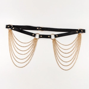 Detail of black leather belt with multi-layer gold chain tassels and metal buckles