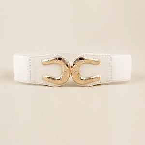 Close-up of white elastic waist belt featuring textured gold horse-shoe metal buckle