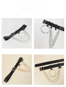 Detail of punk leather belt featuring large metal rings and triple-layered chain accents