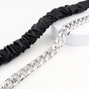 Elastic PU leather belt with silver chunky metal chain and hanging lock for women