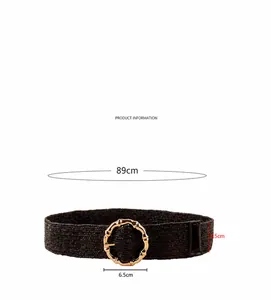 Detail view of woven waist belt with a golden bamboo texture buckle and dimensions