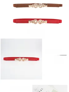 Detail of thin elastic waist belts in brown and red with golden knot metal buckle