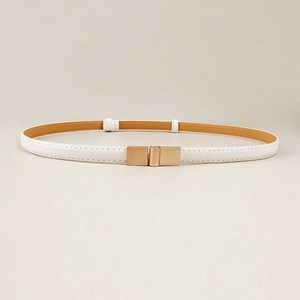 Detail of white leather skinny belt with golden square buckle for women's dresses