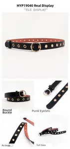 Detail view of black punk PU belt with gold metal eyelets and round buckle
