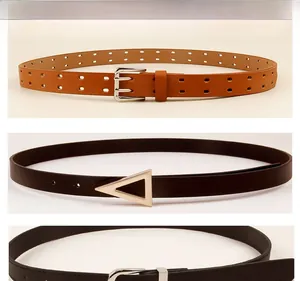 Detailed comparison of thin leather belts with silver square and gold triangle buckles