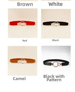 Detail view of elastic waist belt collection featuring golden double ring metal buckles