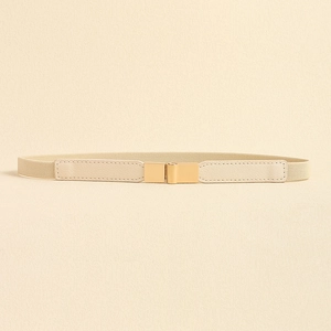 Detail of a beige elastic waist belt featuring a gold-toned square interlocking metal buckle