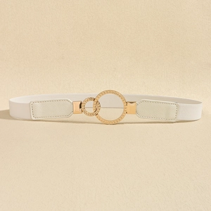 Detailed macro view of white elastic waist belt with double interlocking gold metal rings