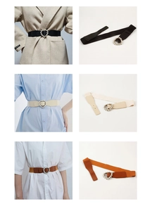 Detail of elastic waist belt featuring heart-shaped buckle with faux pearl embellishments