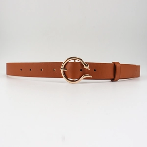 Detailed view of a brown leather belt with a circular gold buckle and fine stitching
