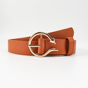 Close-up of brown leather belt with unique gold fox-shaped metal circular buckle