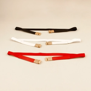 Three-piece set of elastic waist belts in black, white, and red with gold metal buckles
