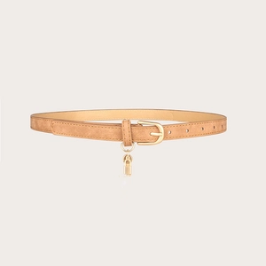 Detail of camel leather belt featuring a polished gold pin buckle and a padlock pendant