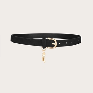 Slim black leather belt with golden buckle and decorative key and lock charm detail