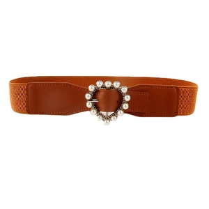 Brown elastic waist belt for women with pearl heart buckle on a clean white background