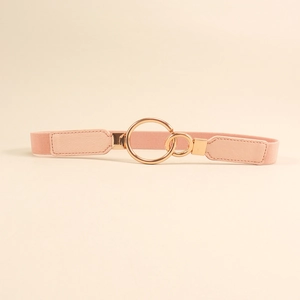 Detail of light pink elastic waist belt featuring interlocking gold circular rings buckle