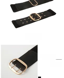 Macro shot of wide black elastic belt featuring golden rectangular buckle and lychee texture