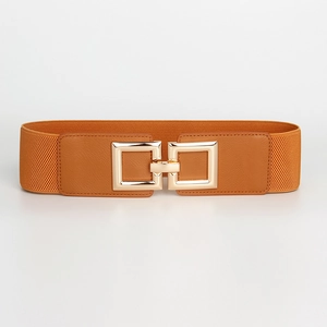 Detail of wide elastic waist belt with brown lychee leather and gold square buckle
