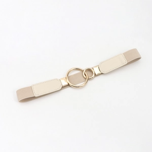 Detail view of beige elastic waist belt with interlocking gold double ring buckle closure
