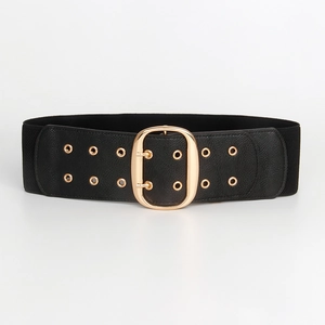 Close-up of a wide black elastic waist belt with gold double eyelets and oval pin buckle
