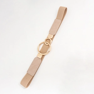 Close-up of golden metal double ring buckle on khaki elastic belt with white stitching