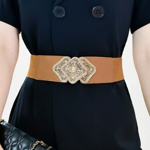 Vintage elastic waist belt in camel brown with gold diamond-shaped ornate metal buckle