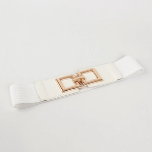 Detail of white elastic waist belt featuring a double square gold metal buckle clasp