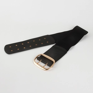 Detailed view of the black elastic wide belt featuring a large gold double-pin metal buckle