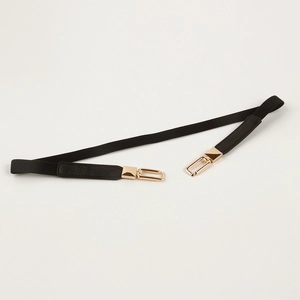 Elegant elastic black waist belt with polished gold rectangular buckle for dresses