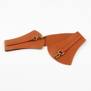 Detailed view of brown elastic waist belt with golden metal horseshoe buckles