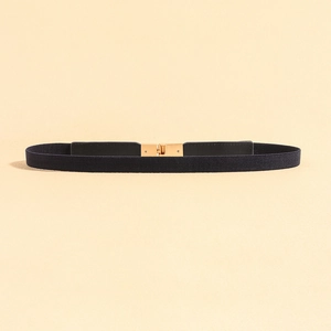 Close-up of black elastic waist belt with a polished gold-tone buckle closure