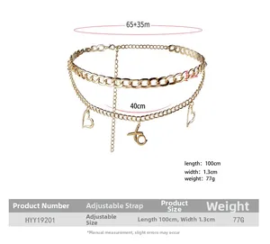 Detail of gold double layer waist chain with heart and XO pendants including dimensions