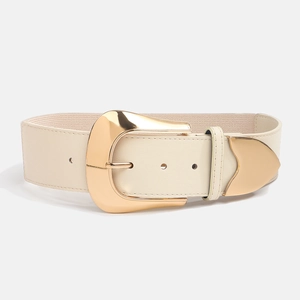 Detail view of a wide beige elastic waist belt with smooth faux leather and a gold buckle