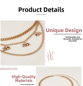 Detail view of golden triple-layer chain with elephant charms and lobster clasp closure