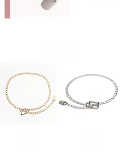 Detail of adjustable chunky metal chain belts in polished golden and silver finishes