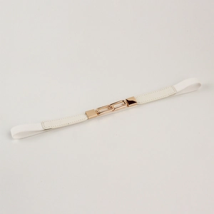 Detail of white elastic waist belt with gold interlocking buckle and faux leather ends