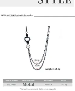 Detail of double-layer punk pants chain with lobster clasps and spiked ring ornament