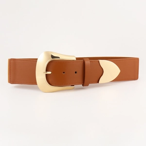 Close-up of brown elastic waist belt featuring a polished gold arc metal buckle