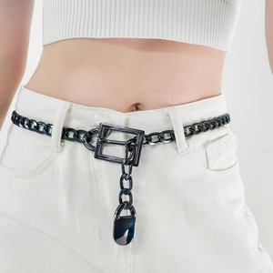 Close-up of gunmetal thick chain belt with rectangular clasp and smooth lock pendant