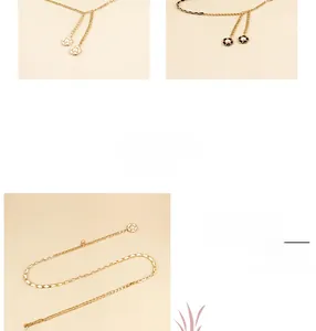 Detailed macro view of golden metal chain belt featuring camellia flower and pearl charms