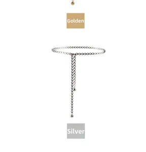 Détails de la chaîne de taille en métal avec anneaux ovales et pompons à pendentif