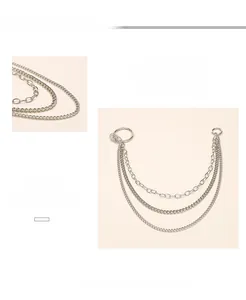 Detail showing triple-layered silver alloy pants chain with punk style ring connectors