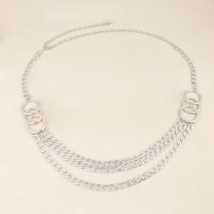 Detail of silver multi-layer metal waist chain with triple draped layers and O-ring links