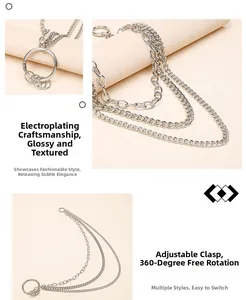 Detail of multi-layer silver waist chain featuring 360-degree rotating lobster clasp